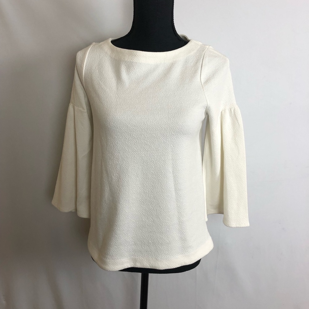 A white new day top with balloon sleeves